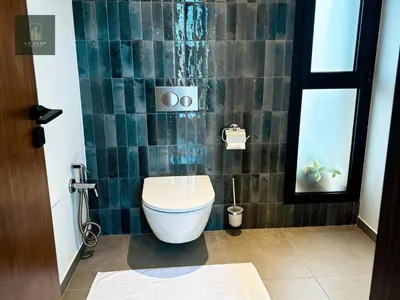 a bathroom with a toilet in a room at MIKESTAY - Villa Luma in Marrakech