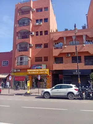 a silver car parked in front of a building at Perle de Guéliz Marrakech in Marrakech
