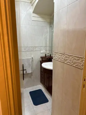 a small bathroom with a sink and a toilet at مراكش كليز in Marrakech