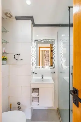 a bathroom with a sink and a shower at Appartement familial 2 ch Wi-Fi 15 min centre in Marrakech