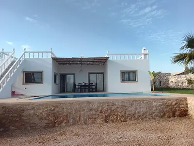 a villa with a view of a house at Alexandra Nomade - Maison de transition & séjours de répit in Marrakech