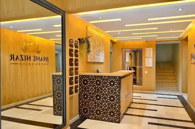 a lobby with a reception desk in a building at Le Petit Medina - 4prs - Wifi - Semlalia in Marrakech