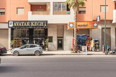a car parked on the street in front of a store at Le Grand Jazzy in Marrakech