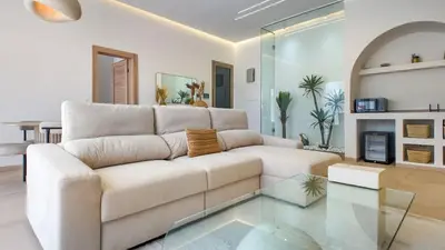 a living room with a couch and a glass floor at Wintering Bungalow-Heated pool not overlooked in Marrakech