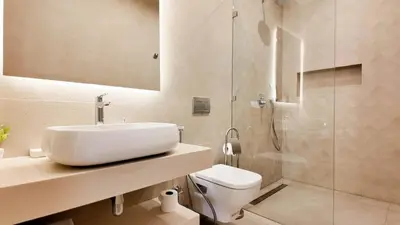 a bathroom with a sink and a toilet and a shower at Villa Maryam heated pool not overlooked in Marrakech
