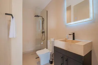 a bathroom with a sink and a toilet and a shower at Havre de paix moderne pour voyageurs exigeants in Marrakech