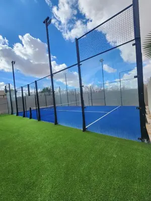a batting cage on a tennis court at Beautiful Villa 15 min Center, Jacuzzi, Padel in Marrakech