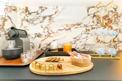 a counter with a cutting board with some food on it at Apartment in Victor Hugo 10 minutes from Jemaa el-Fna in Marrakech