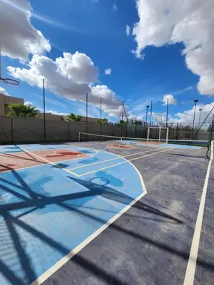 an empty basketball court with a basketball hoop at Luxury Villa with No Overlooking 15 min from Marrakech in Marrakech