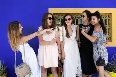 a group of women standing next to each other at Villa Chocolat in Marrakech