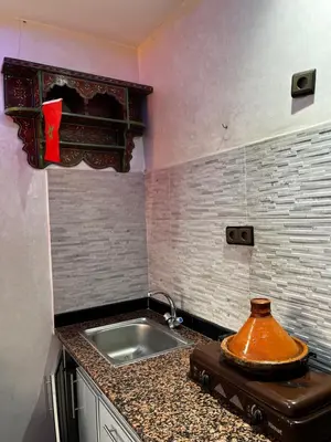 a kitchen with a sink and a counter top at cozy studio in Kennaria, 1 min from Jemaa el-Fnaa in Marrakech