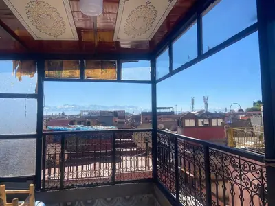 a view from the balcony of a building at cozy studio in Kennaria, 1 min from Jemaa el-Fnaa in Marrakech