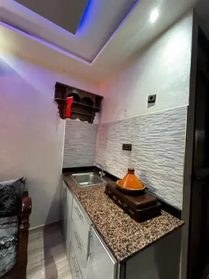 a kitchen with a counter with a sink and a ceiling at cozy studio in Kennaria, 1 min from Jemaa el-Fnaa in Marrakech