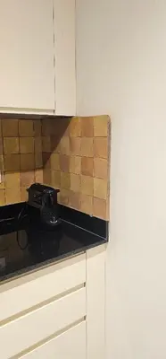 a kitchen counter with a phone on top of it at Muma Appartment in Marrakech