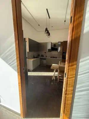 a view of a kitchen from the door of a house at Exceptional Villa Private Pool and Breakfast in Marrakech