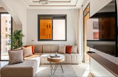 a living room with a couch and a table at Rental unit in Marrakech in Marrakech