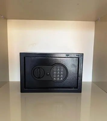 a microwave oven hanging on a wall at Appartement Haut Standing 2 Chambres avec 2 Terrasses au Centre Gueliz Marrakech in Marrakech