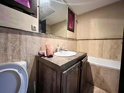 a bathroom with a sink and a toilet at City zen gueliz 1BR apartment in Marrakech