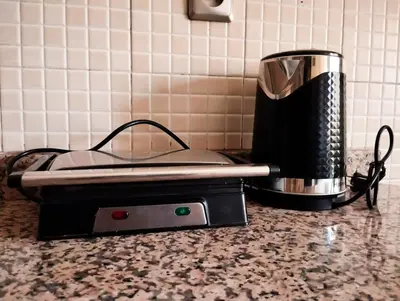 a coffee maker sitting on top of a counter at Marrakech Guéliz Piscine & Terrasses Ensoleillées in Marrakech
