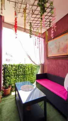 a living room with a couch and a table at Marrakech Guéliz Piscine & Terrasses Ensoleillées in Marrakech