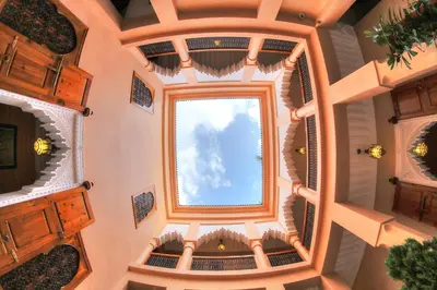 a circular room with a window in a building at Dar Tasnime in Marrakech