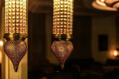 two chandeliers are hanging in a room at Savoy Le Grand Hotel Marrakech in Marrakech