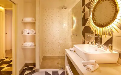 a bathroom with a sink and a mirror at 2Ciels Boutique Hôtel in Marrakech