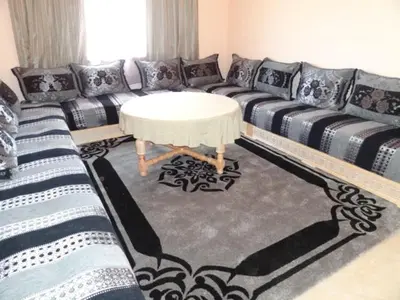 a living room with a couch and a table at Apartment Twins 12 in Marrakech