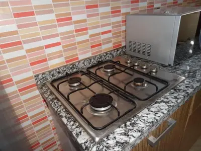 a stove top oven sitting on top of a counter at Apartment Twins 12 in Marrakech