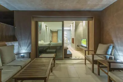 a living room with a couch and a table at Prestigia 16 in Marrakech