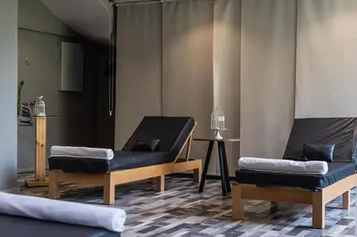 a room with two chairs and a table at Wazo Appart-Hôtel in Marrakech