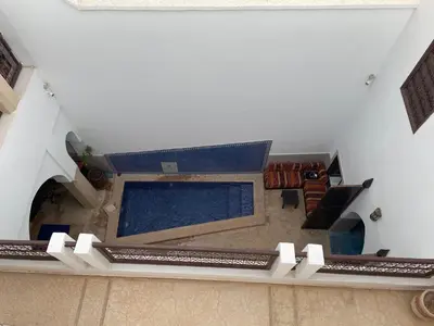 an overhead view of a swimming pool in a house at Riad Safia in Marrakech