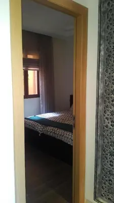 a door leading to a bedroom with a bunk bed at Appartement Privé au Vizir Center Marrakech in Marrakech