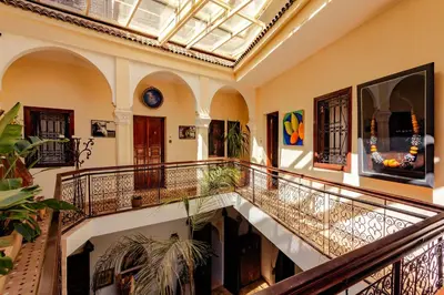 an indoor staircase in a building with a ceiling at Color Safrà in Marrakech