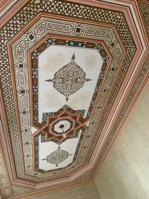 an ornate coffered ceiling in a building at Riad Tidar by Phoenix in Marrakech