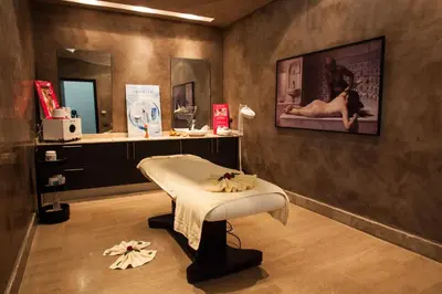 a hospital room with a bed and a mirror at Kenzi Club Agdal Medina - All Inclusive in Marrakech