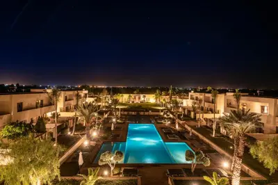 an aerial view of a resort at night at Sirayane Boutique Hotel & Spa Marrakech in Marrakech