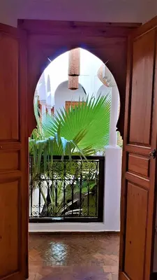 a room with an archway with a plant in it at Riad Safina in Marrakech