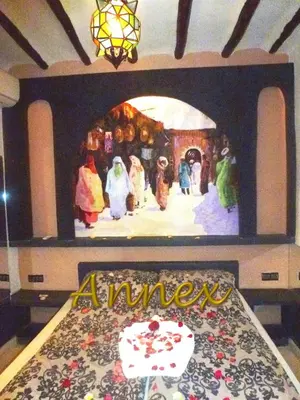 a table with a sign that says amnesia on it at Ryad Laârouss Family in Marrakech