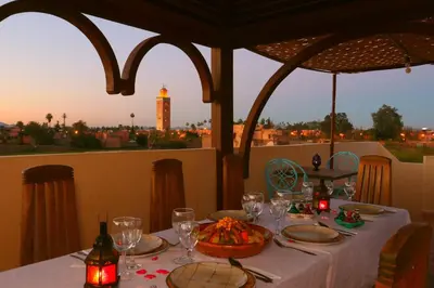 a table with a bowl of food on top at Riad Sidi Mimoune & Spa in Marrakech