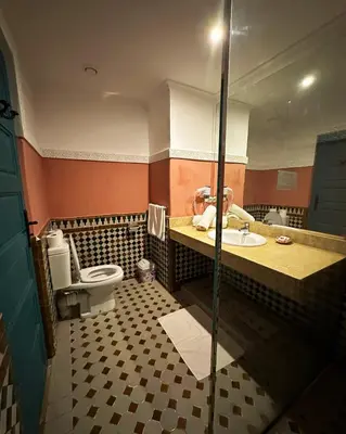 a bathroom with a sink and a toilet at Palais Riad Berbère in Marrakech