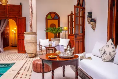 a living room with a couch and a table at Riad Adika & Spa in Marrakech