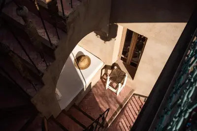 an overhead view of a hallway of a building at Riad Kbour & Chou in Marrakech