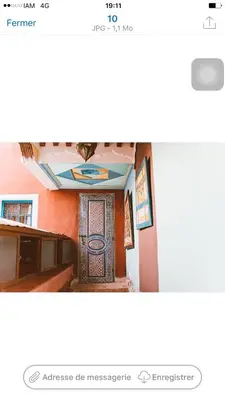 a picture of a room with a tile on the wall at Riad Tarik in Marrakech