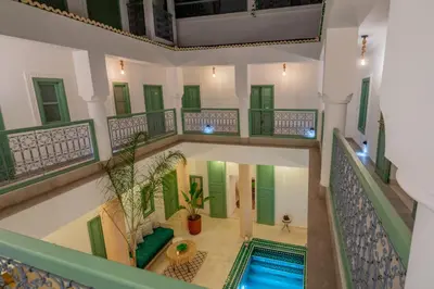 an overhead view of a house with a swimming pool at Riad Trésor in Marrakech