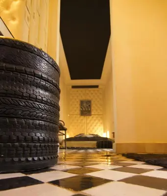 a room with a stack of tires on the floor at Dar Crystal in Marrakech