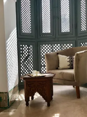 a living room with a couch and a coffee table at Riad Hadika Maria in Marrakech