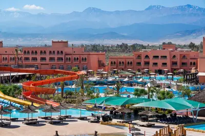 a resort with a water park with a slide at Pickalbatros Aqua Fun Club All Inclusive in Marrakech