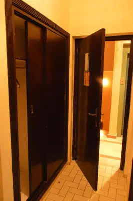 an open door in a room with a hallway at Hotel Amalay in Marrakech