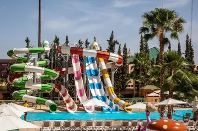 a water slide in a swimming pool at Rose Aqua Park Hotel in Marrakech